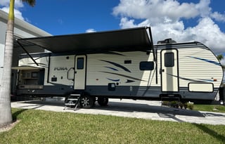 “Our Cozy Happy Place Travel Trailer Rental Puma “