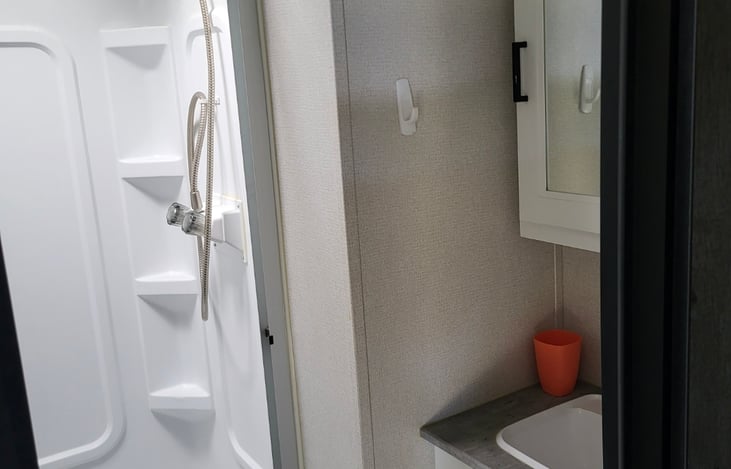 Bathroom with shower. Simple but practical