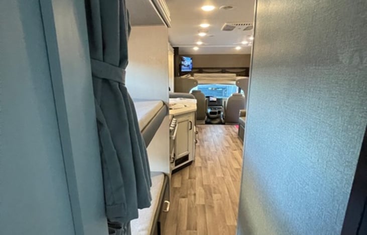 View of hallway from rear cab of RV.