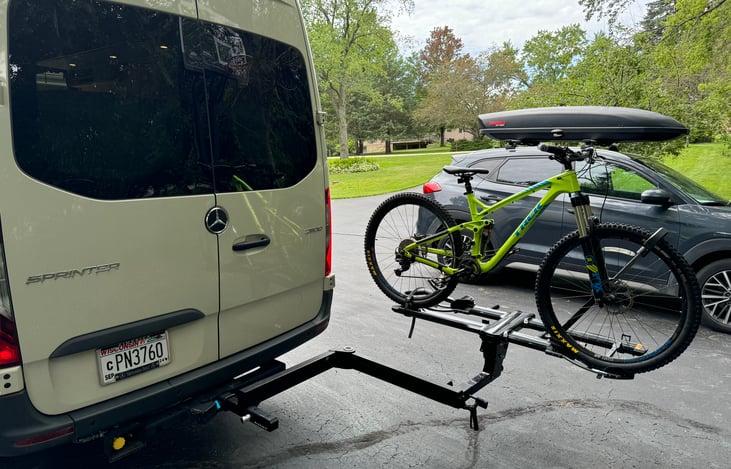 Swing out bike rack. Fat tire compatible.