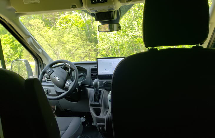 front cabin, notice large navigation/backup camera screen