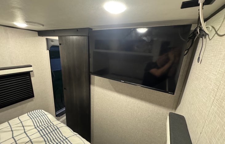 Main sleeping area - Roku Smart TV with HD antenna to pull in lots of local channels. Can also be tethered to a cell phone for streaming options.
Also TV can be mounted outside with KeBloc mount