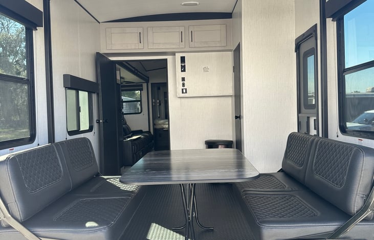 You can leave the top bunk up and put the bottom down, then it folds into seating for table space.