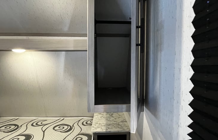 Each cabinet includes hangers