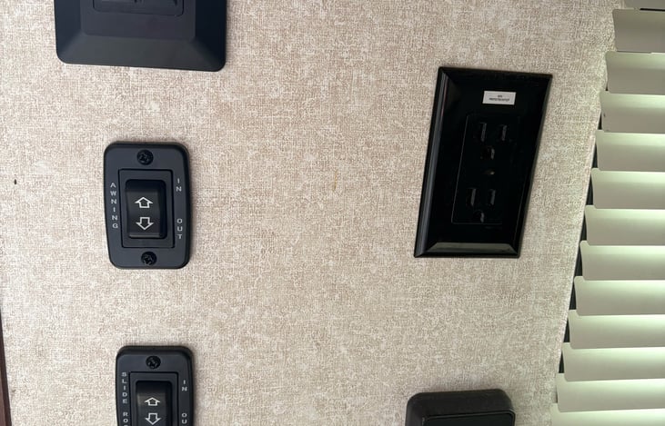 slide out switch, sunshade switch, gauges for grey, black, and fresh water