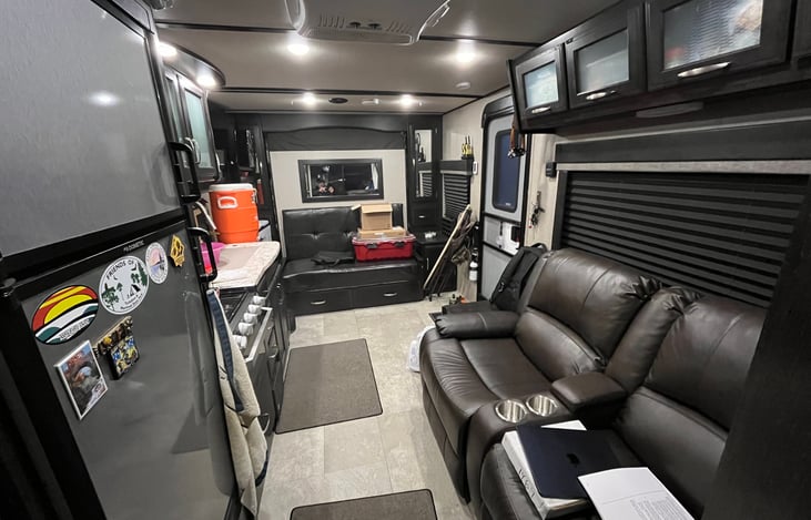 Interior looking from rear to front with murphy bed stowed.