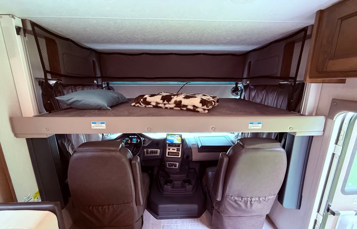 Power Drop down cab bunk with 250 lbs weight capacity.