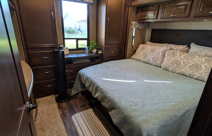 Private bedroom with King Bed, lots of storage and TV