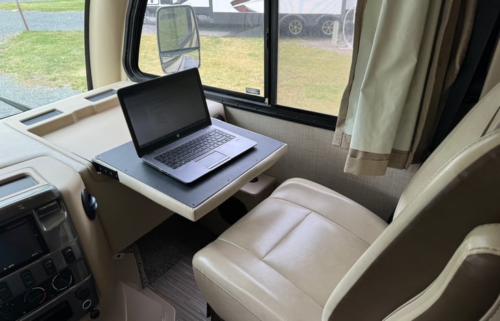 Passenger side working table. Great for a snack, or for a laptop!