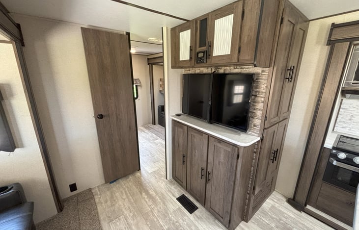 Roku TV, Bluetooth Radio, and entertainment Center