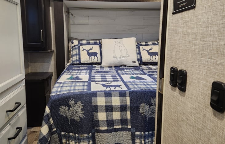 Reading lights above queen-sized bed