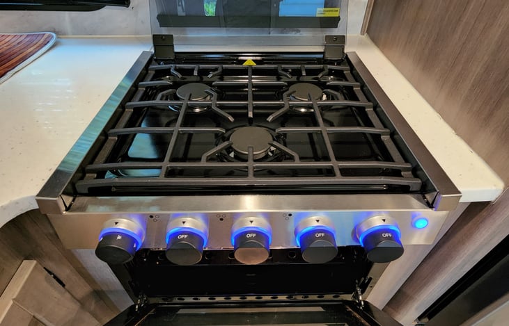 3 Burner stove runs off propane which we provide.