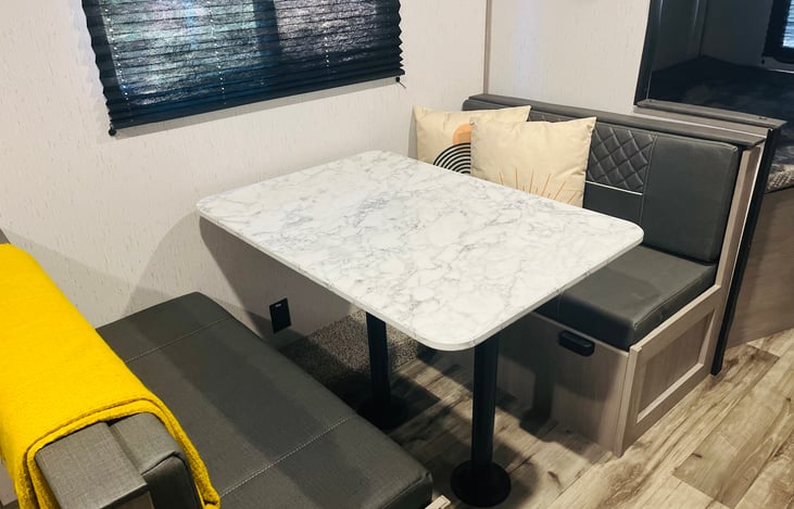 The dinette turns into another sleeping area.