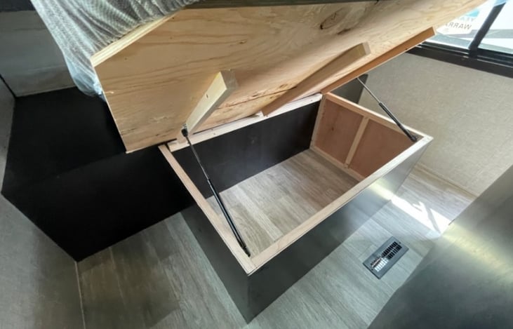 Extra storage can be found under the bed.