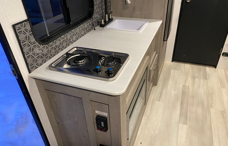 Two burner gas stove and sink