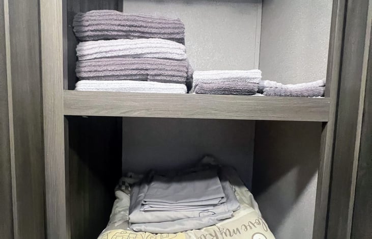 Linen closet in bathroom