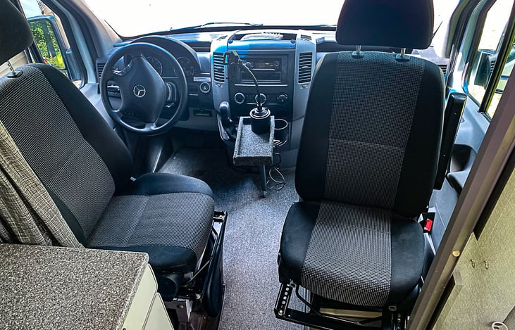 Front seats rotate -- Vanessa has seating and seat belts for 6 people.