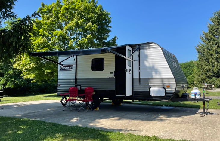 We will provide two camping chairs and a little side table to put beside your chairs.