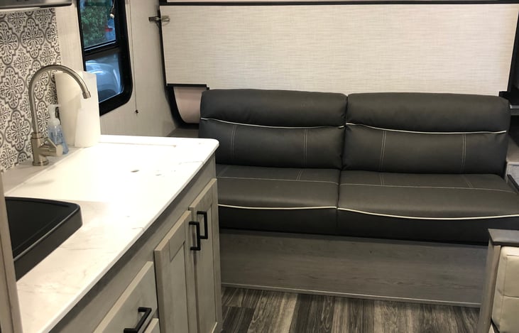 Sofa and Queen Size Tempur pedic Mattress Murphy bed