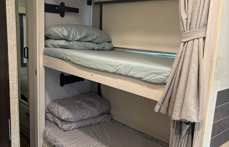 Bunk Beds with individual lights, plugs & I-pad Holders