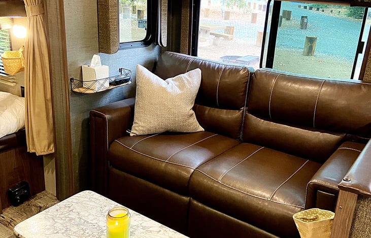 It's a couch...not just for holding suitcases...but also for sitting.