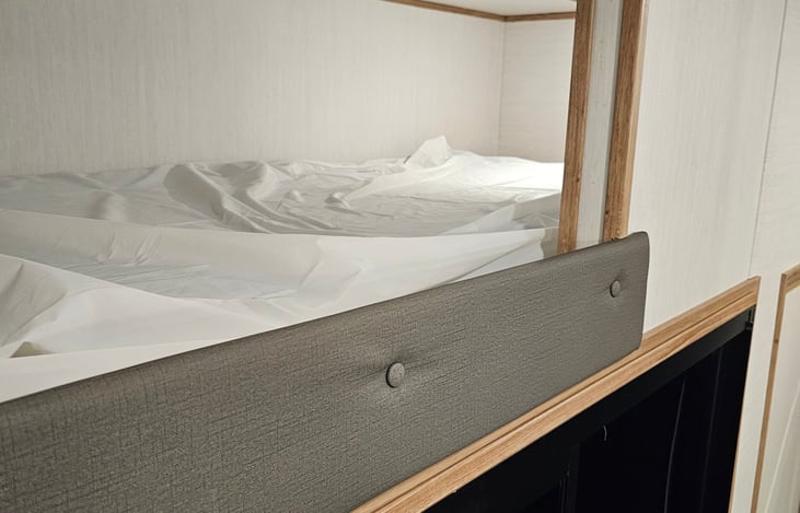 Loft bed can sleep 2 access in the kitchen. Area