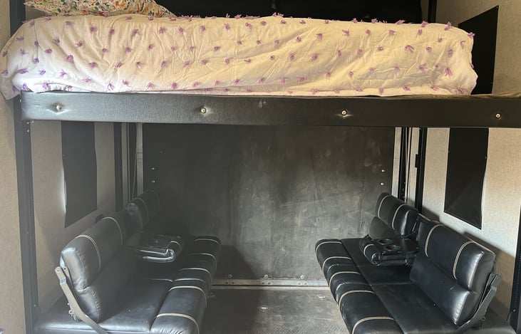 Comfortable seating area with a real full-size bed.