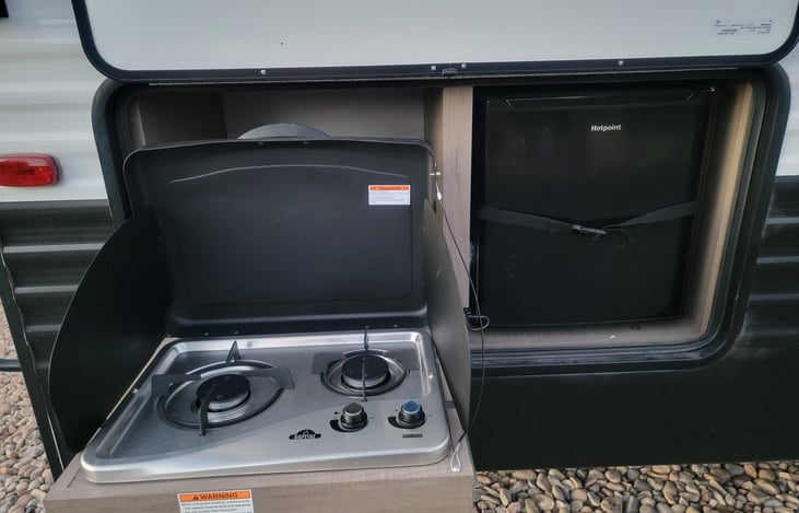 Outside Kitchen (stove and mini fridge)