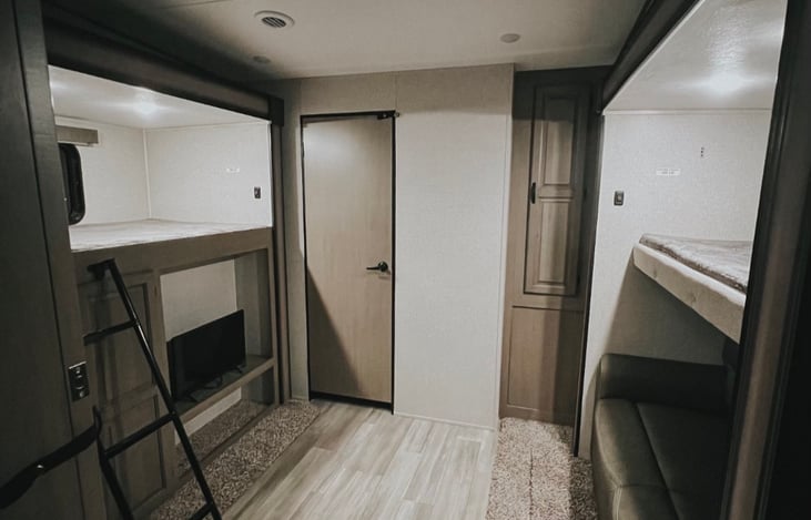 Second bedroom with plenty storage, two bunk beds and a sofa that converts on a full bed.