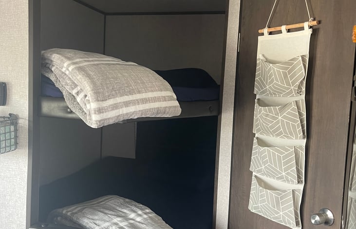 Double Full Size Bunks each with light and USB charging docks.