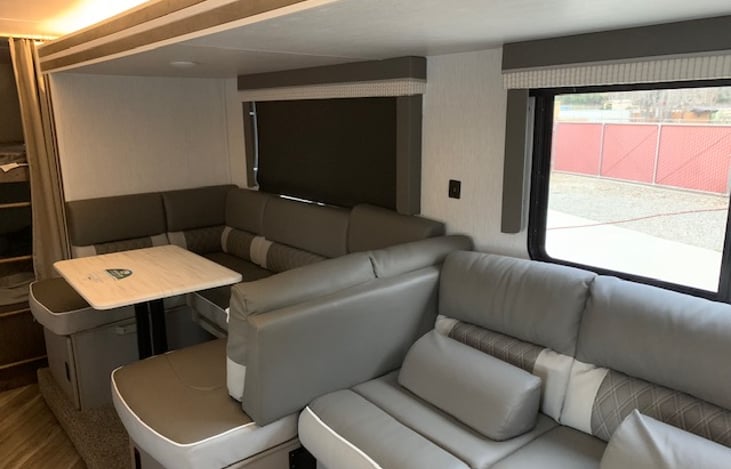 Convert the dining room table and couch into a comfy bed for the family.  Or just relax and watch some family movies on those cozy nights.