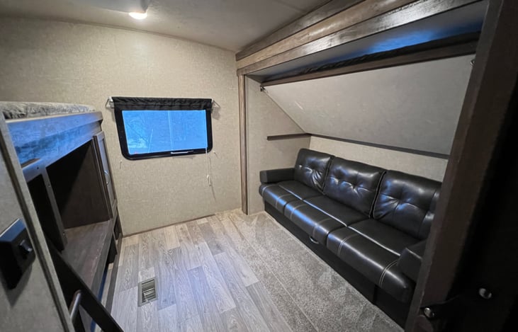 Bunkhouse: two twin bunks and fold out couch below