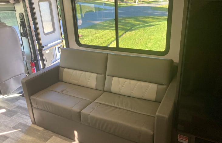 Living room sofa which lays flat to a double bed