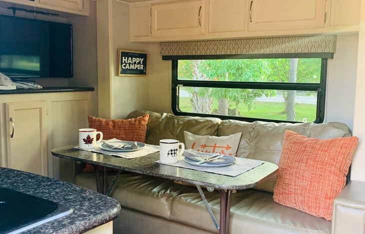 Easy folding table to use inside or under awning