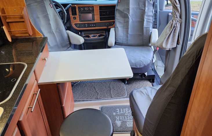 Front seats turned around to engage in conversation, have a meal or play a game