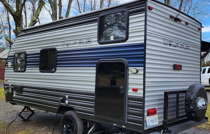 Camper back with pass thru door