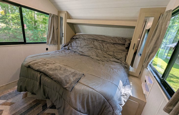 Cozy King-size Versa-Tilt bed lifts into a seated reading position with the push of a button.