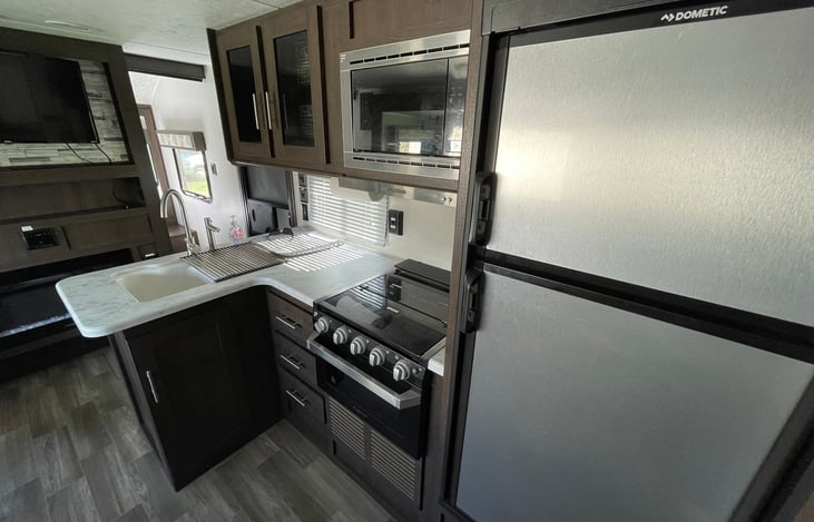 Spacious kitchen with everything you'll need plus a large fridge!