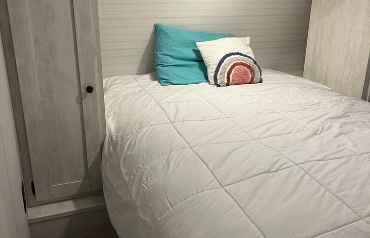Primary bedroom with privacy doors