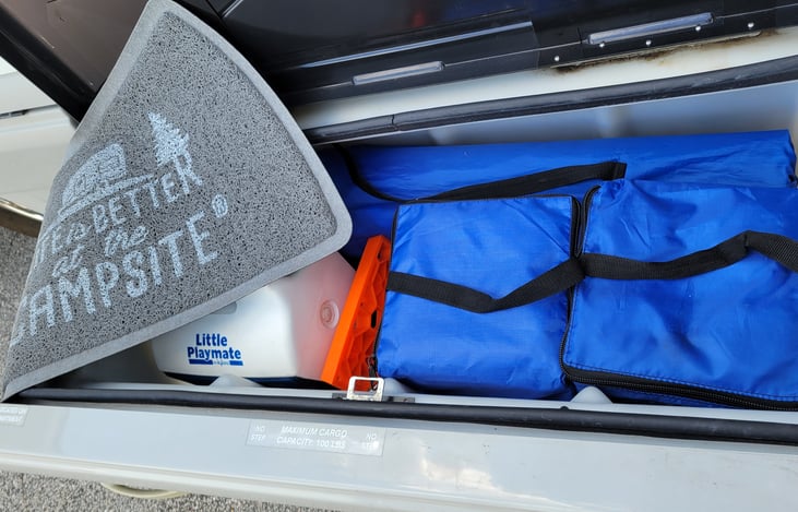 Life is better at the campsite, little Playmate cooler and easy to use leveling blocks if needed.