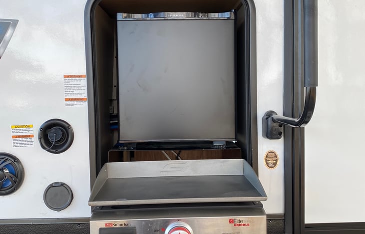 Camp kitchen refrigerator and griddle