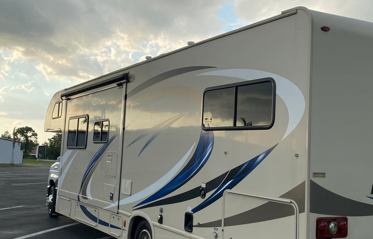 Living area slide out and outdoor shower
