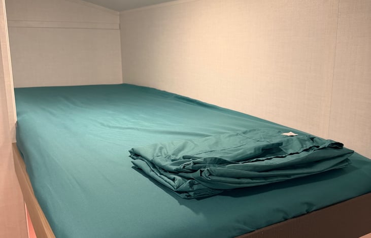 Bunks come made up with fresh sheets and blankets.