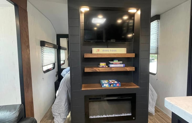 Entertainment Center with Smart TV and Hot/Cold electric Fireplace.