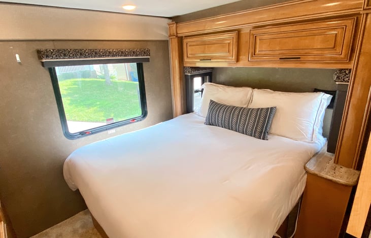 Comfortable master bedroom retreat with a queen bed. Linens and bedding can be provided and may differ from photo.