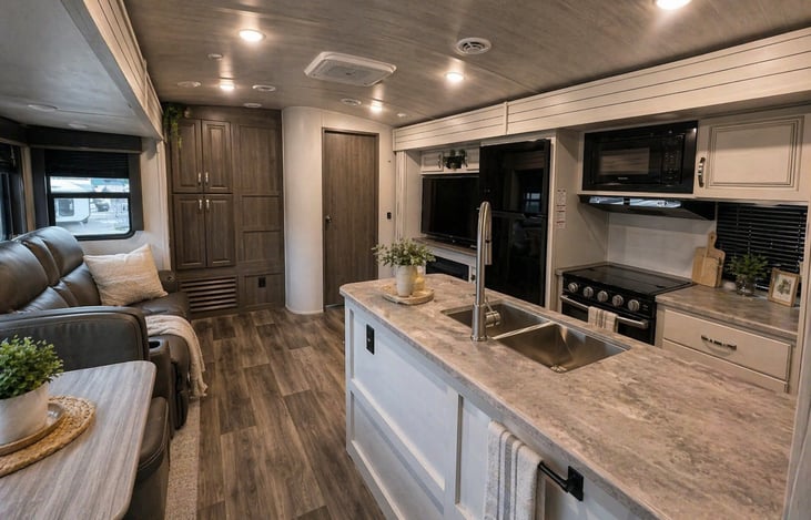 Main area: kitchen, dinette, cooking utensils, pots/pans, coffee maker (w/ filters), recliners with heated seated and massage!