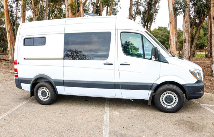 Multiple windows to provide natural light. Windows in rear slide open with screen protection.