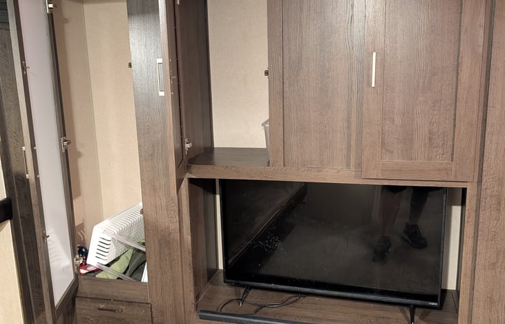 Back bunkhouse TV and storage cabinets