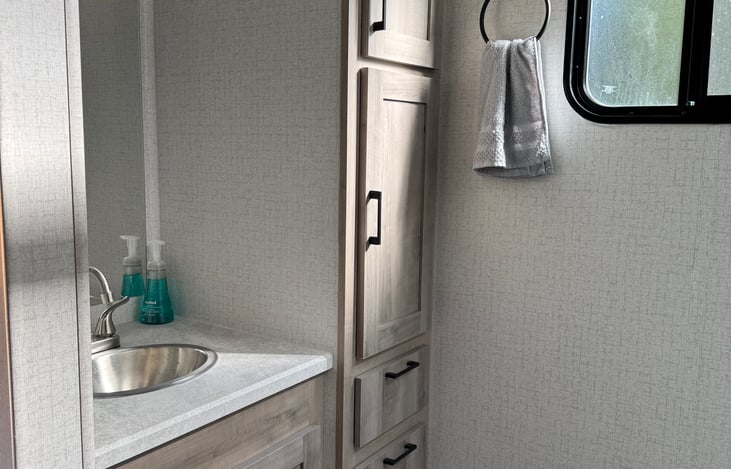 Bathroom sink and cabinet