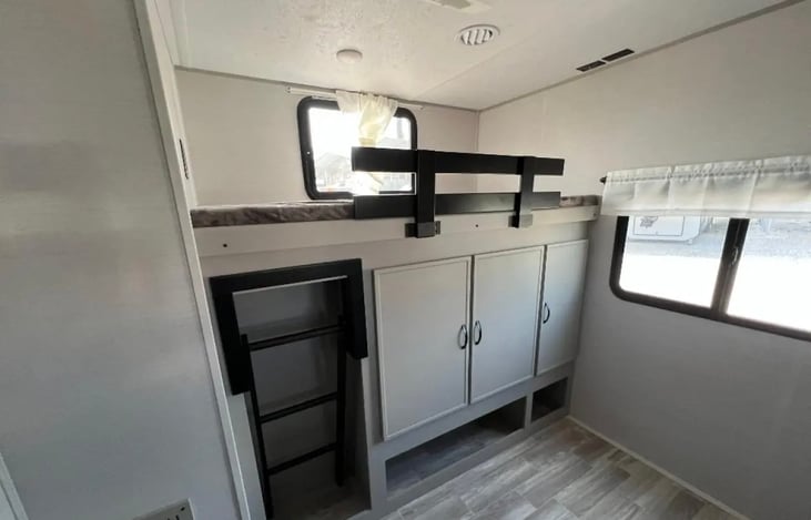 Twin top bunk and storage